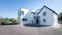 A cottage in name only, this €690k Ovens home has a nice architectural geometry