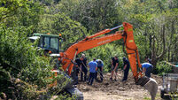 Watch: Army personnel sift through the soil on Michael Gaine's land