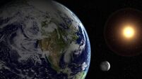 Sun, moon, earth and starfield